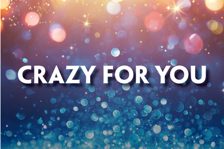 This promotional image for Crazy for You features the title in bold, white letters against a sparkling, bokeh background. The backdrop transitions from warm golden tones at the top to cool blues at the bottom, evoking a lively and festive atmosphere.