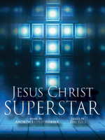 This promotional image for Jesus Christ Superstar features the title in bold, white letters against a sparkling, bokeh background. The backdrop transitions from warm golden hues at the top to cool blues at the bottom, with light sparkles adding a sen